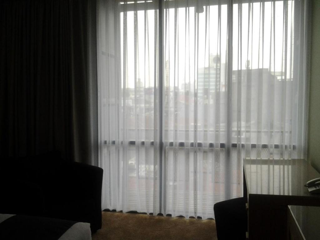 Chara Hotel Бандунг Стая снимка
